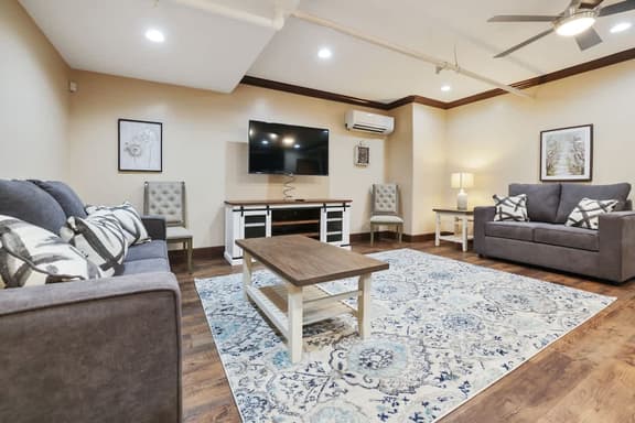 Chic Downtown Loft w/ City Views & Workspace